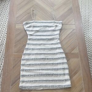 fab'rik Carrie Cream & Black Striped Spaghetti Strap Ruffle Mini Dress